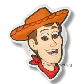 Jibbitz Disney Pixar Toy Story Woody – прикраса для кроксів у вигляді Вуді, персонажа з мультфільму "Історія іграшок" від Pixar