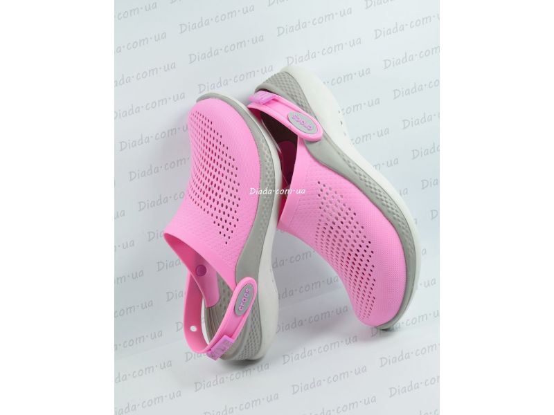 Живе фото Crocs LiteRide 360 Taffy рожеві на фоні магазину Diada