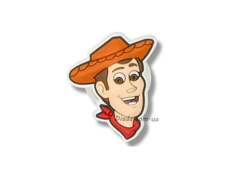 Jibbitz Disney Pixar Toy Story Woody – прикраса для кроксів у вигляді Вуді, персонажа з мультфільму "Історія іграшок" від Pixar